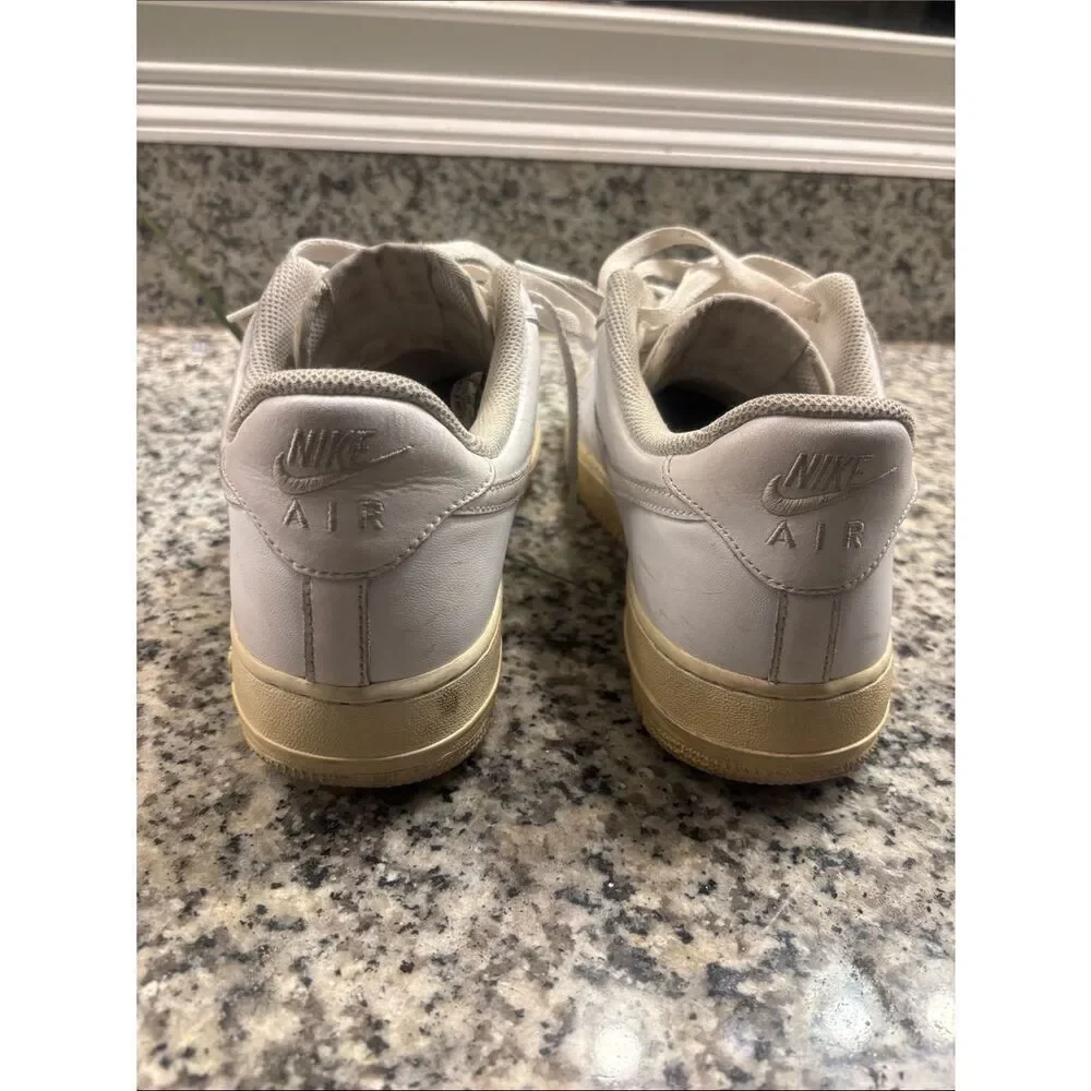 Nike Air Force 1 White Low-Top Sneakers with Cream Sole